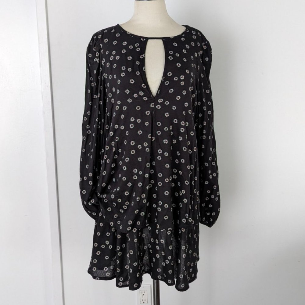 Free People ruffled mini dress with key-hole neckline and pockets